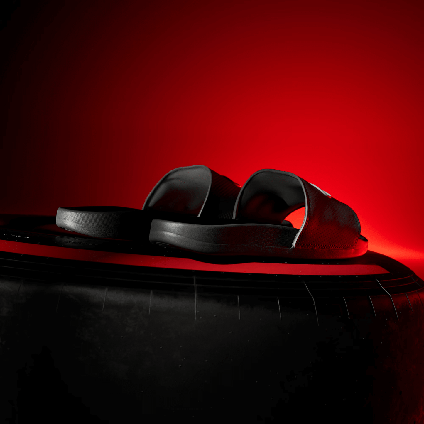 
                  
                    Men's Adilette Comfort Audi Revolut F1 Team Slides - 'Utility Black'
                  
                