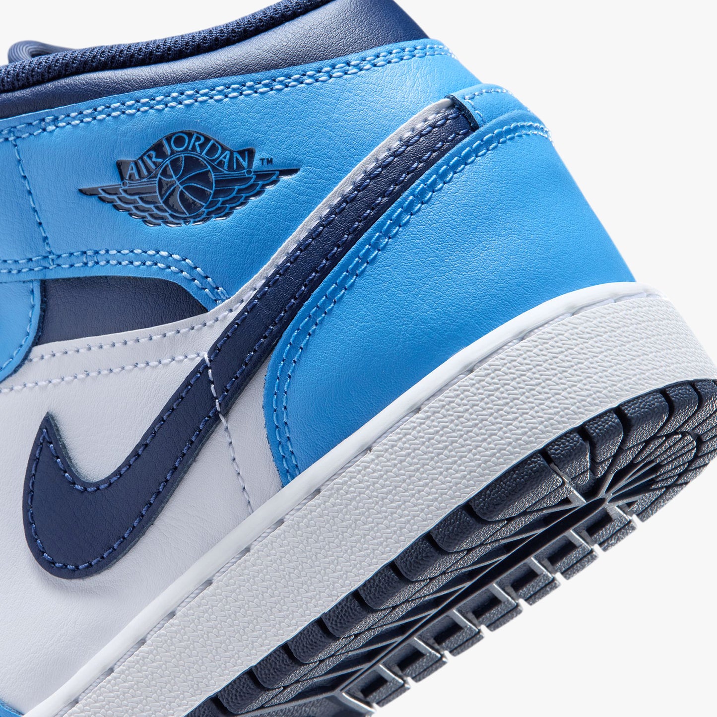 
                  
                    Gradeschool Air Jordan 1 Mid - 'University Blue'
                  
                