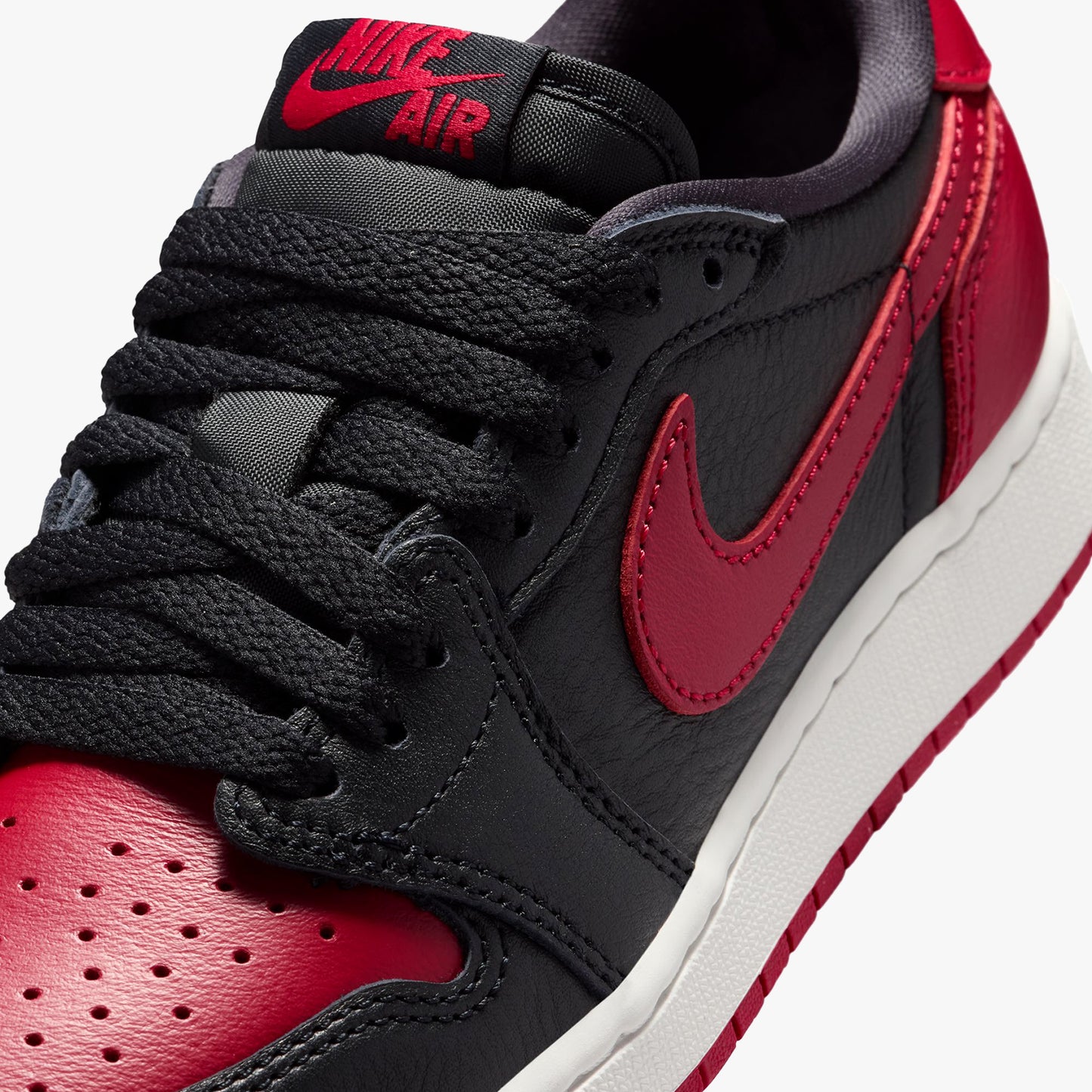 
                  
                    Gradeschool Air Jordan 1 Retro Low OG - 'Banned' (RD:5/2/26)
                  
                